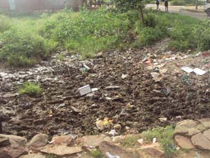 कस्बा मा कूड़ा का ढेर
